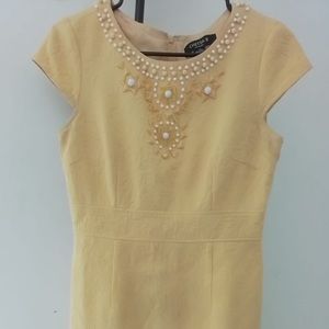 Chet’s B yellow dress